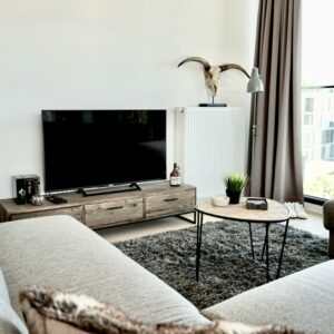 Woonkamer inrichten met zachtere materialen: zo creëer je meer warmte, rust en sfeer